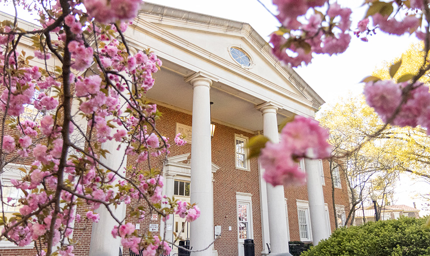 Roanoke College campus admin building with cherry blossoms