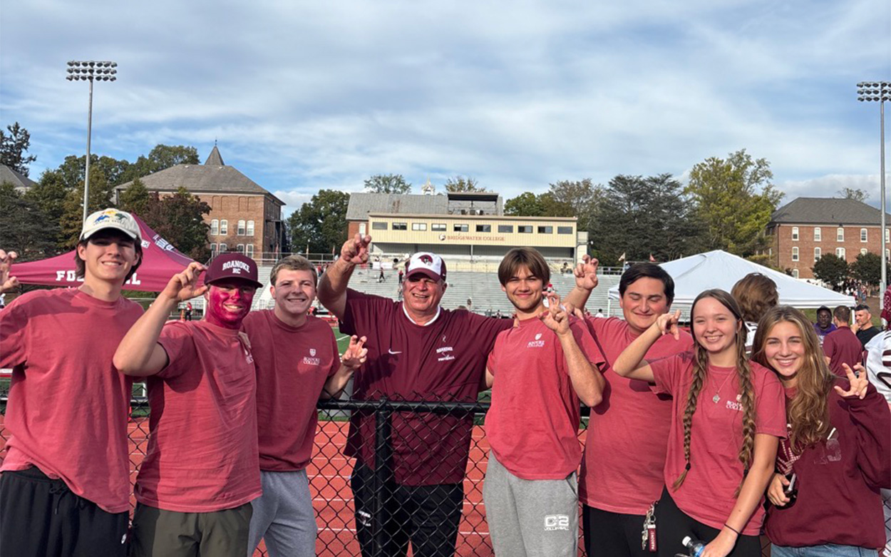 Students group photo football game