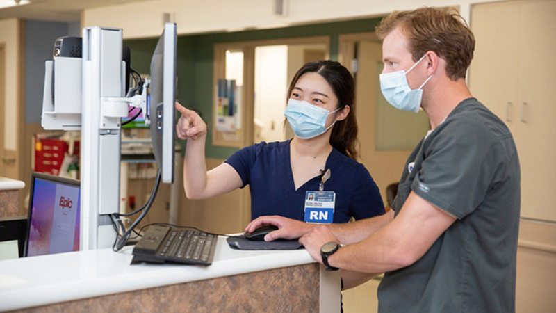 Medical Professionals looking at screen