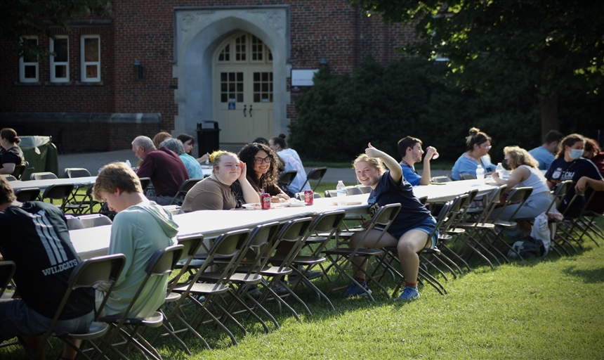 photo of students on the back quad for FOTQ, thumbs up!