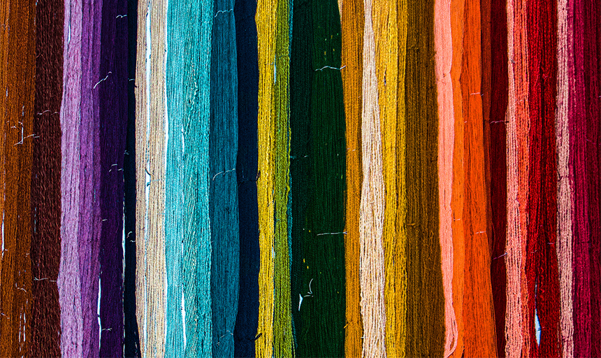 vertical strings of yarn