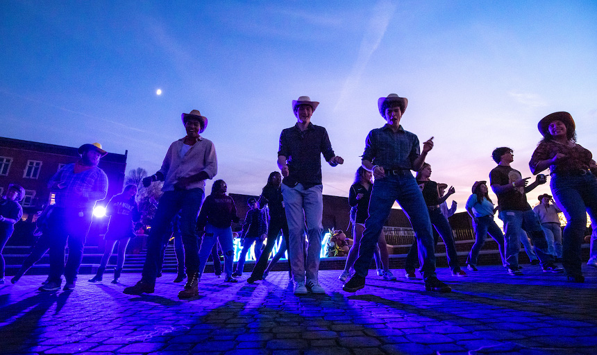 photo of students line dancing 