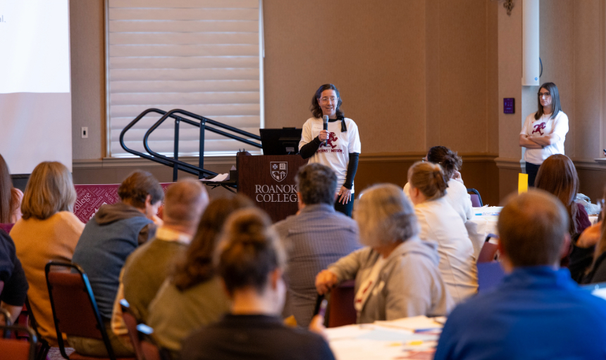 Dr. Laura Hartman speaks to faculty and staff in the Wortmann Ballroom ahead of a group discussion on character education.
