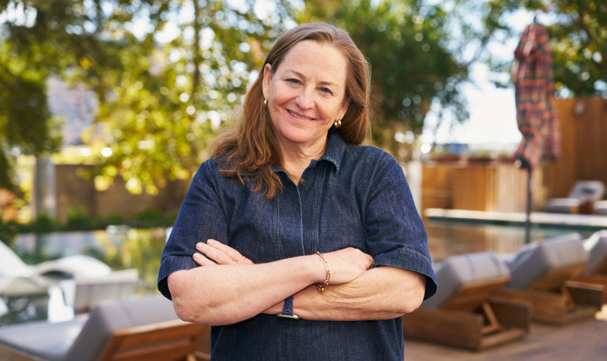 Deb (Murray) Lemon '90 poses outdoors for a headshot.